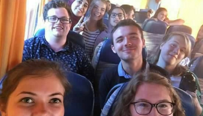 Image of William and his exchange friends on a bus