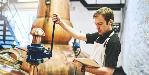 Man working in a distillery