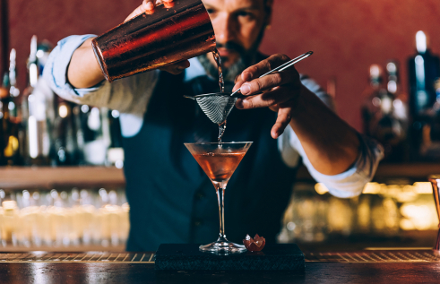 Barman making cocktails