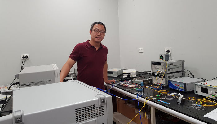 Hao in his electrical engineering office