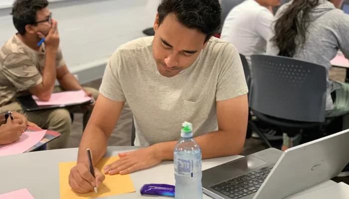 Sulav Shrestha  studying in the library 