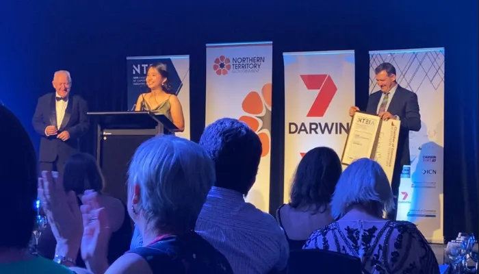 Erika accepting her award at the ceremony