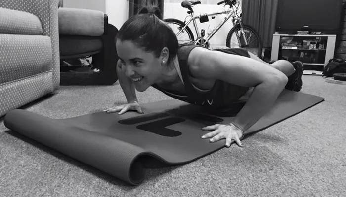 CDU Student Bridie doing a Burpee