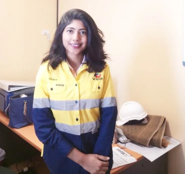 A portrait of CDU student Sharina Mundeeb in high-vis clothing