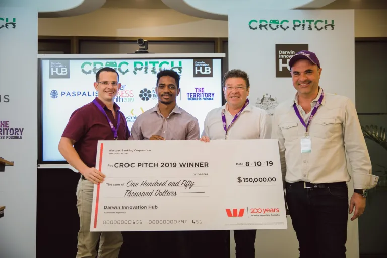 Winners of Croc pitch 2019 holding a cheque