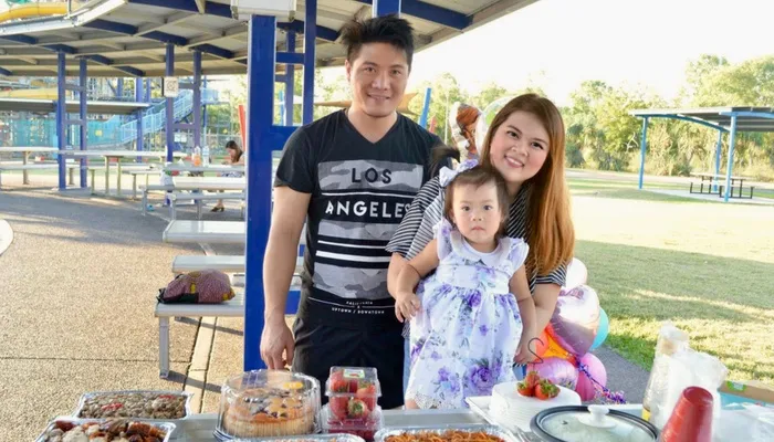 Zarah at a picnic with her family