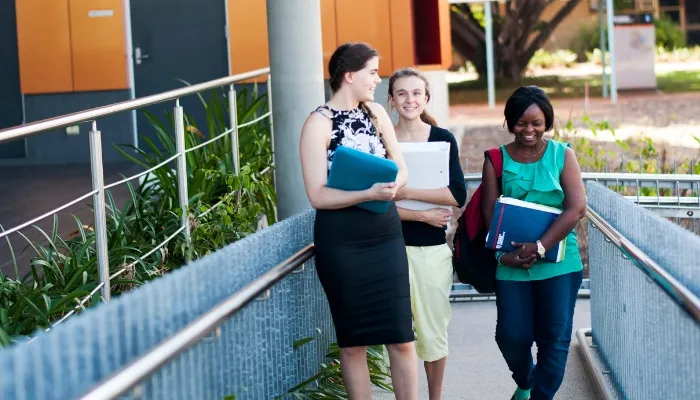 Group of three students on campus