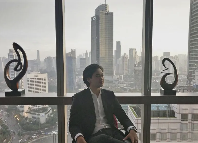 CDU student Max Stretton against the backdrop of a big city