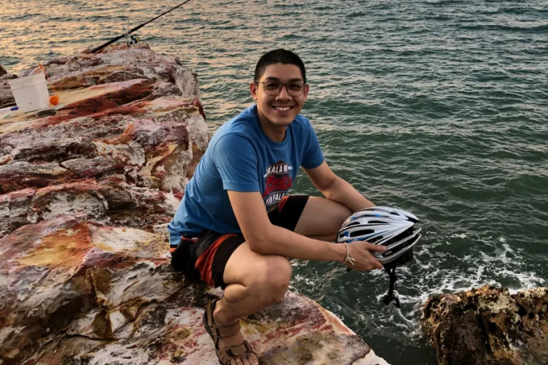 International student Lloyd fishing