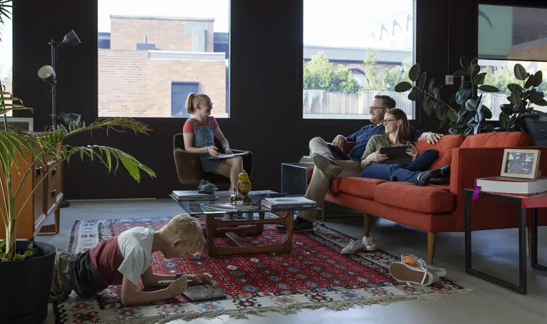 CDU student Michelle in the living room with her family