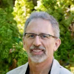 Matthew Northwood head, with green leafy background