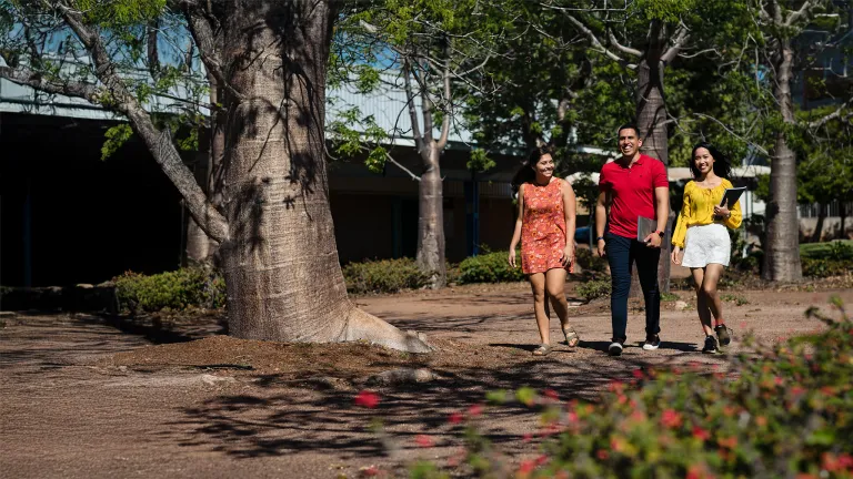 CDU students walking across Casuarina campus
