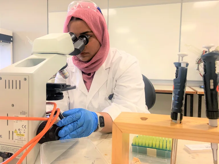 Medical Laboratory Science student Hajrah in the lab at Casuarina campus
