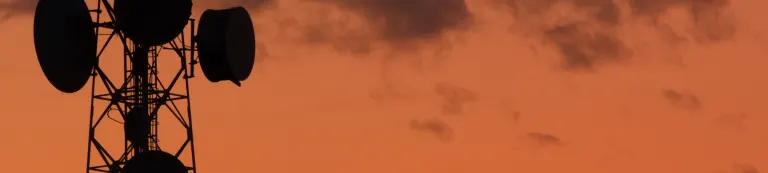 Telecommunications tower at dusk