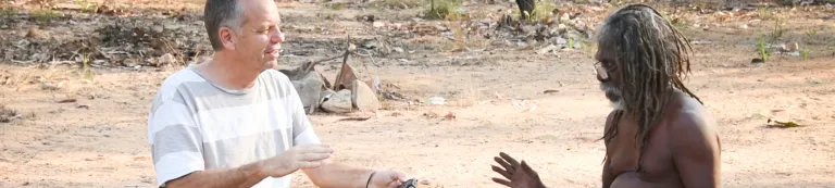 Conversation between Aboriginal man and white man