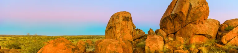 Round boulders and skyline at dusk