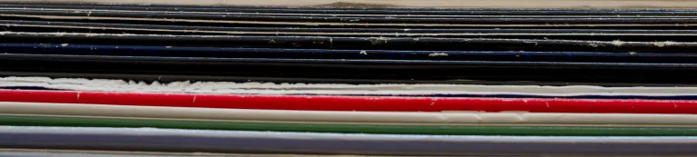 Stack of old records to be transcribed