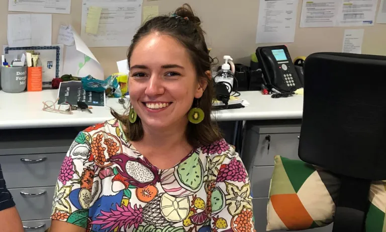 Teaching student Breanna at work