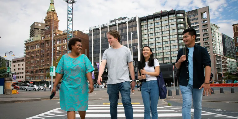 Image of students walking in front of CDU sSdney