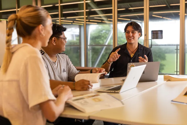 Students studying in library