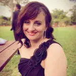 young female smiling with brunette hair