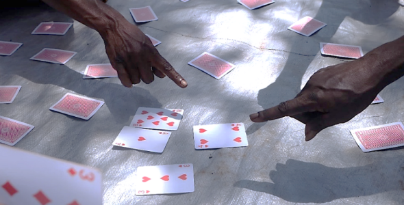 People gambling with card games in Tiwi Islands
