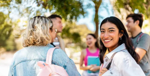 A group of students chatting happily
