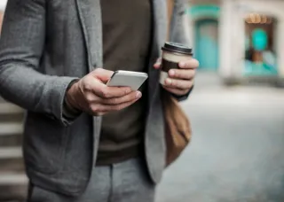 Man checking schedule on mobile
