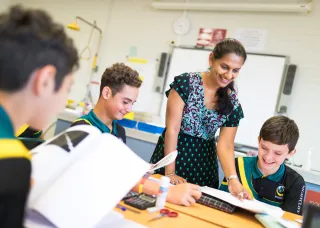 Students and trainee teacher in classroom