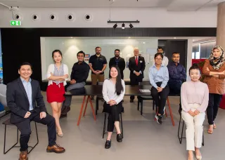 Business professionals in meeting room