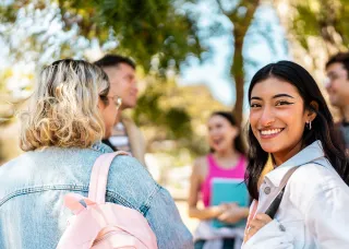 A group of students chatting happily