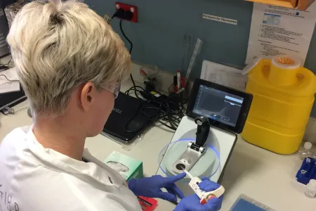 Staff in white coat (RIEL image only)