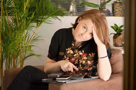 Katelyn Rossiter with social media devices.