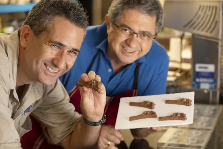 Brett Murphy and Leo Cleanthous with the new chocolate quolls