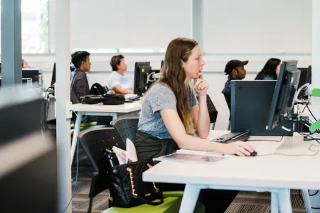 Student facing computer in computer lab