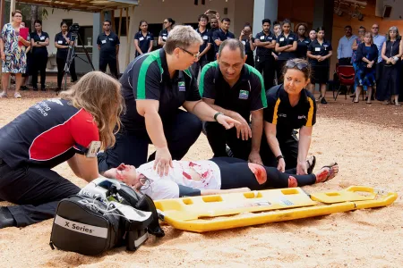Aeromedical Retrieval demonstrators hudled around an injured person
