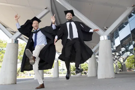 Charles Darwin University 2019 Nursing graduates James Stoddart and Samir Amiri at the last in-person graduation before the COVID-19 pandemic