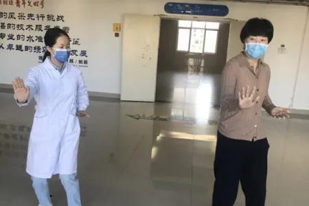 CDU researcher Li Qun Yao teaches tai chi to breast cancer survivor Qingxia Lin at the Affiliated Hospital of Putian University, Fujian, China