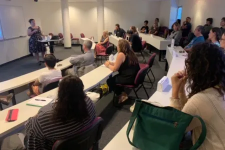 Lecture room with audience and seminar in progress