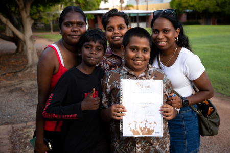 Children's University student with their certificate of achievement