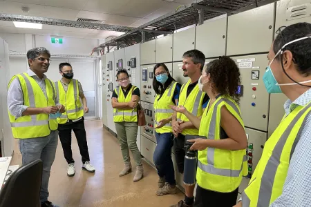 Charles Darwin University (CDU) has teamed up with Alice Springs Future Grid to integrate more renewable energy into the power grid of the Central Australian town.  Pictured: CDU’s Energy and Resources Institute Director Professor Suresh Thennadil (right).