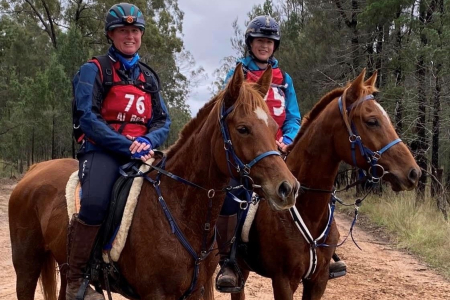 Jessica and Natalie on horses training for the Derby. 
