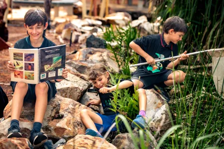 National Science Week will run from August 12 to 20 across Australia with a wide range of activities for all ages to enjoy. From L-R: Miguel Clark, Eleanor Hallett and Rafael Clark are in an epic quest for bugs.