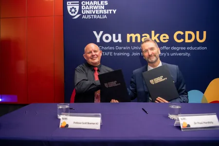 A new Partnership Agreement ‘AIMS@CDU’ has been signed between Charles Darwin University (CDU) and the Australian Institute of Marine Science (AIMS) to benefit the Northern Territory’s marine science research community. Pictured; CDU’s Vice-Chancellor Professor Scott Bowman and AIMS CEO Dr Paul Hardisty