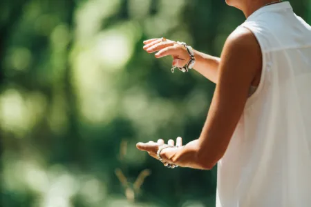image of a woman's hands doing tai chi