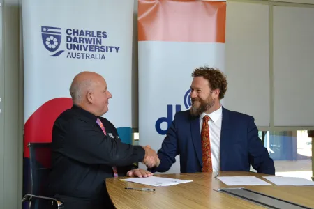 CDU VC and DKA CEO shaking hands