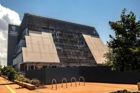 The façade of Charles Darwin University’s new city campus is complete ahead of the wet season, capping off the building’s main protection against Darwin’s tropical heat and humidity.