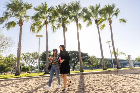 Students Walking at the Waterfront