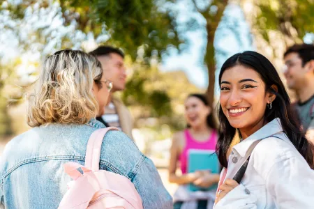 A group of students chatting happily