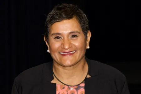 Professor Yvette Roe Smiling with Black Blazer